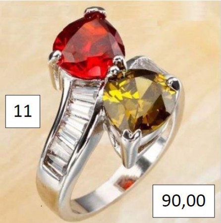 /products/anel-banhado-a-ouro-com-granada-peritodo-e-topazio/